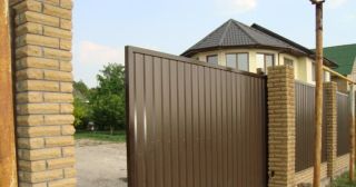 Купить откатные ворота из профнастила Инта, цена от 1735 руб.